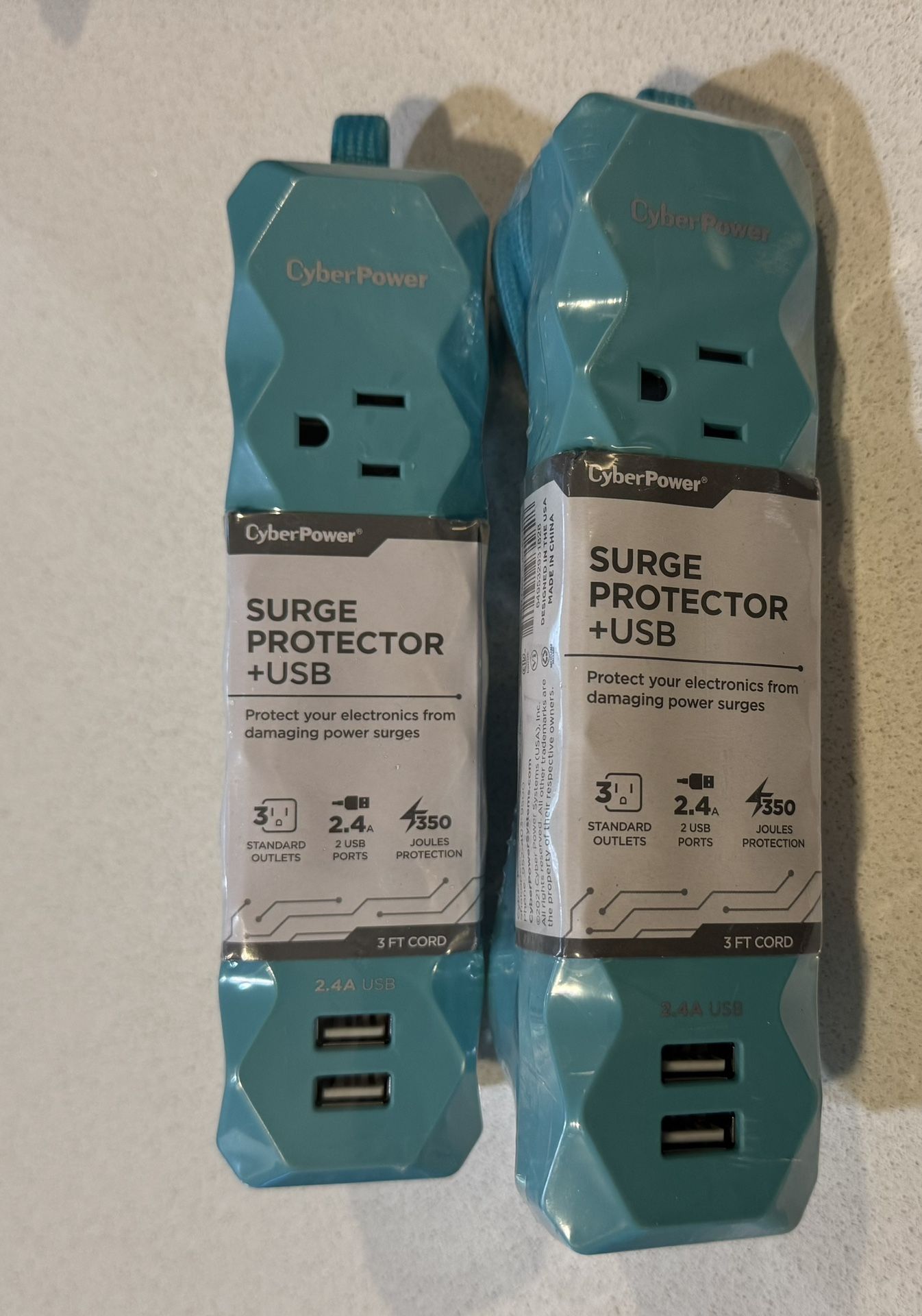 Set of 2  SURGE PROTECTOR + USB Protect your electronics from damaging power surges 3 STANDARD OUTLETS 2.4A 2 USB PORTS 7350 JOULES PROTECTION