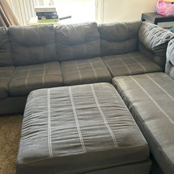 2 piece Sectional with Pull Out & Ottoman