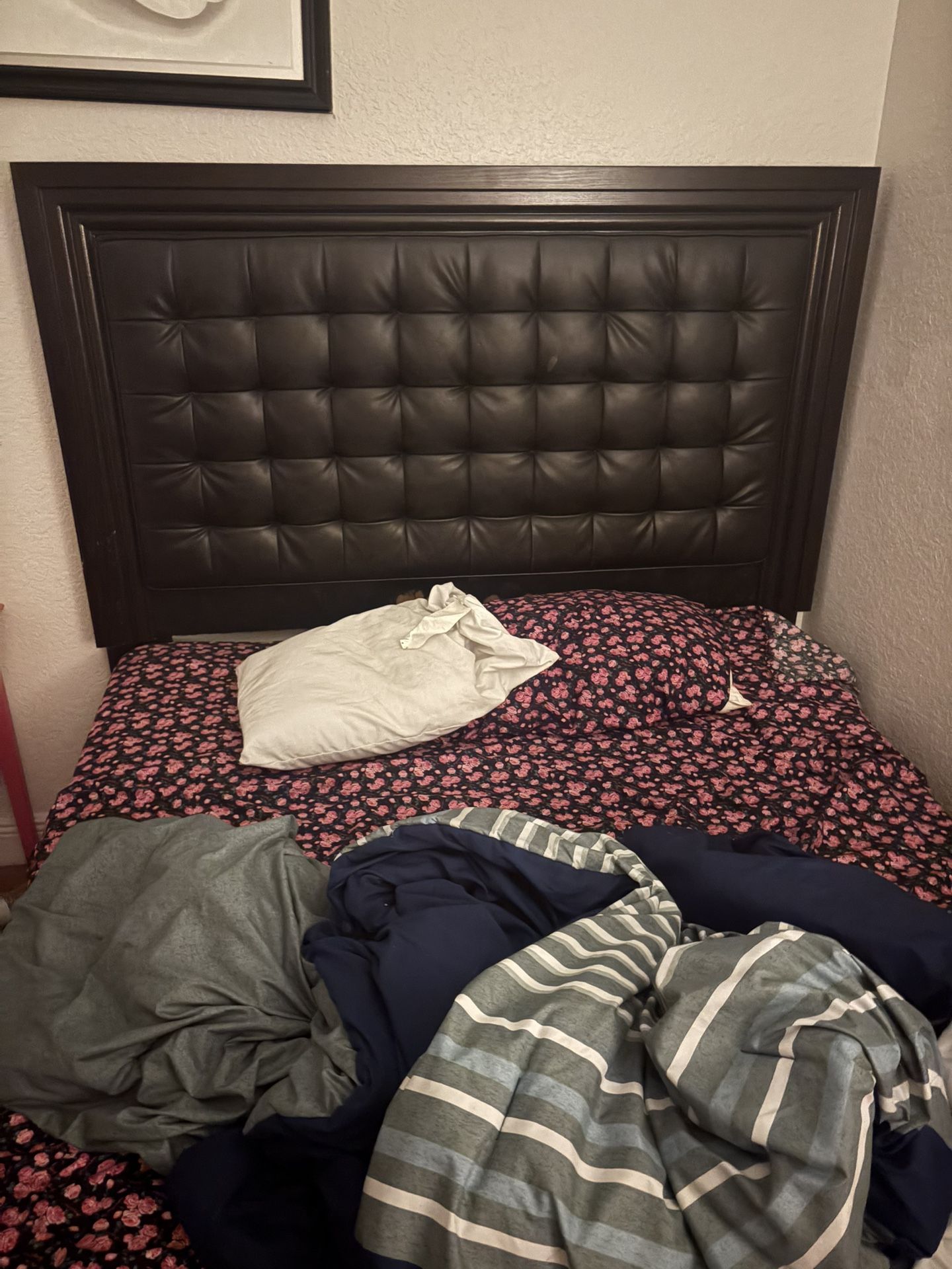 dark brown wooden bed and nightstand set