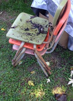 Small plastic child's chair needs a little paint on the legs