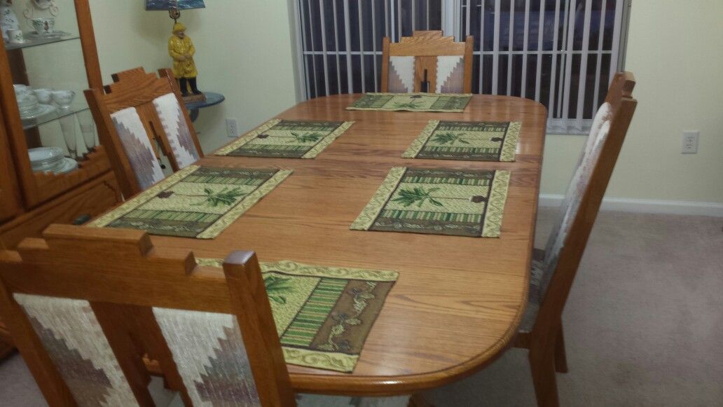 Oak dining table and chairs