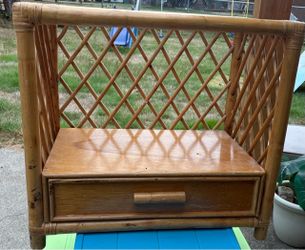 Glass top bamboos table and a small cabinet