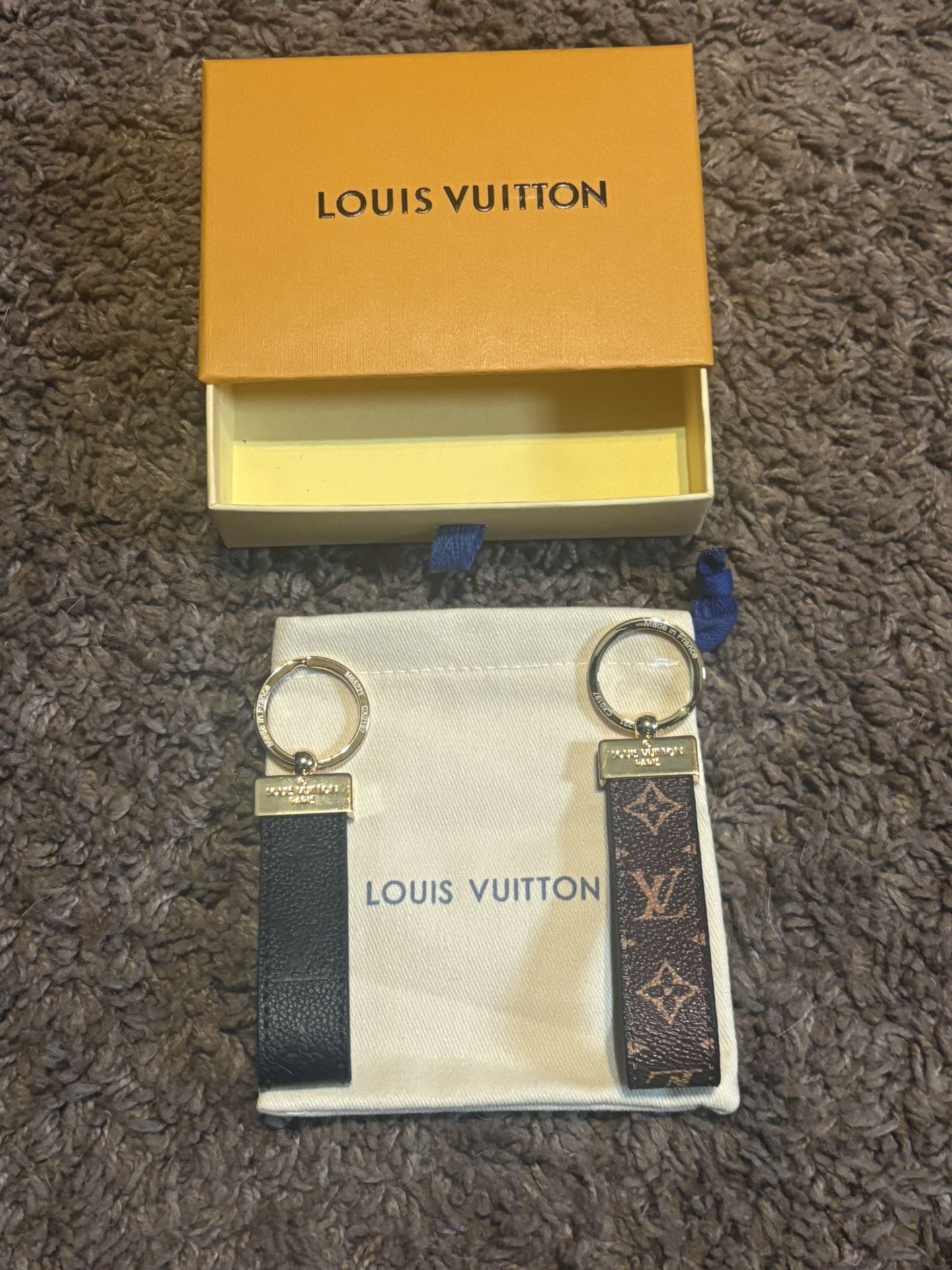 Louis Vuitton Black and Brown Keychains - $50 each