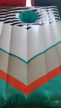 Inflatable corn hole game