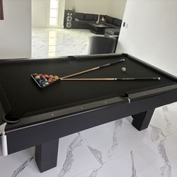 Black and silver pool table (4ft x 8ft)