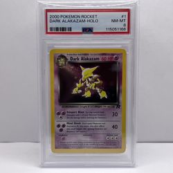 DARK ALAKAZAM PSA 8 2000 POKEMON TEAM ROCKET #1/82 HOLO 