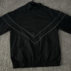 Black reflective windbreaker