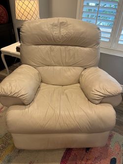 Loveseat, recliner, area rug