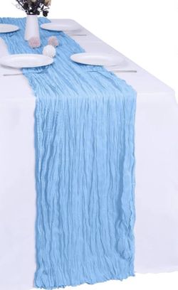 Baby blue cheesecloth table runners