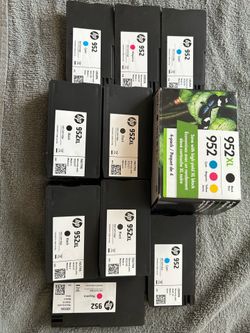 Genuine HP 952 and 952XL ink cartridges Includes multiple Black XL, Cyan, and Magenta. Comes with empty 4-pack XL box. All look unused/new in packagin