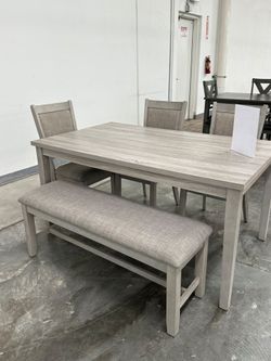 6 pc dining set  new in a box. We offer delivery and installation