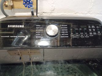 Black Samsung washer and dryer