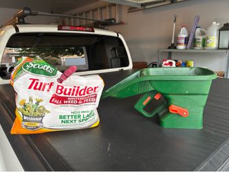 Scott’s Handheld Fertilizer plus partial bag of fertilizer.