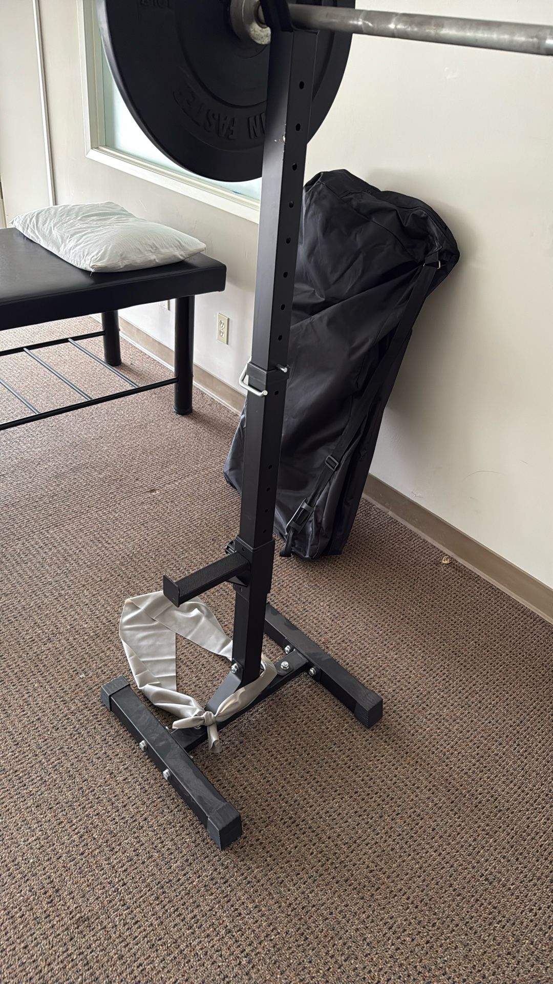 Squat Rack, Barbell, And Weights