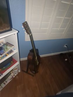 Rouge fine instuments beginner guitar I can do cheaper or if you have any good old working phone with no password I'd gladly trape