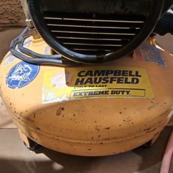 Air compressor electric with hose.