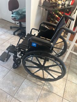 Wheelchair- 16” Seat Width Medline Wheelchair with Footrests ( like new )