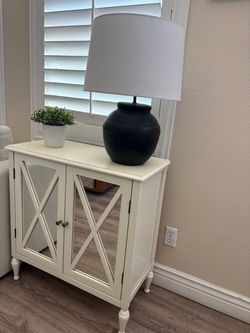 White Mirrored Accent Cabinet with X-Frame Doors