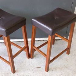 2 Stools And A Half Circle Table. 