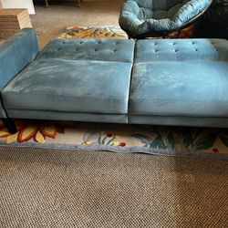 Sofa Bed, Chair, And Rug