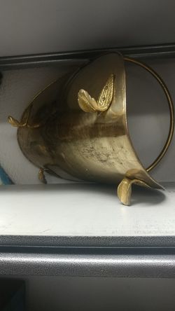 Brass firewood holder