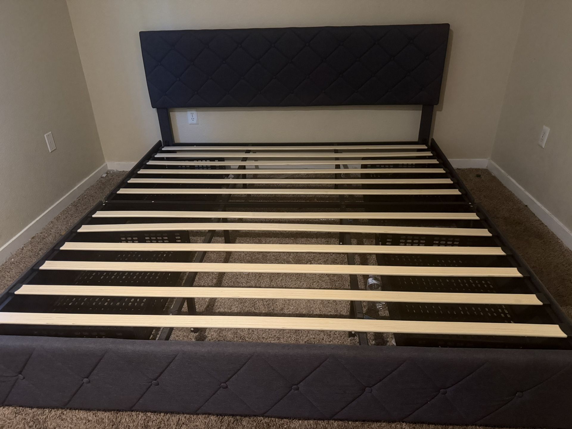 grey king sized bed frame with drawers