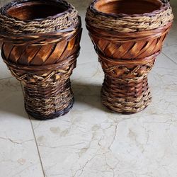 2 Matching Small Rattan Vases 10" Tall by 7" wide by  9" deep.  Ceramic inside!