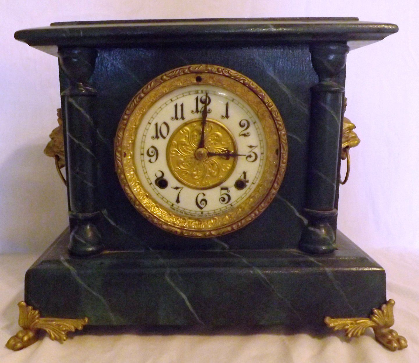 Mantle Clock Mechanical Wind Up Antique Wooden w/Brass Lions Claw Feet.