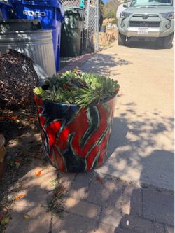 Large artistic pot with succulents