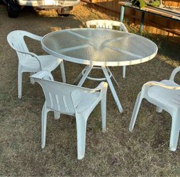 Glass table patio set