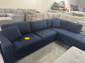 Blue sofa couch with ottoman