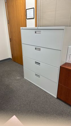 4 drawer locking metal cabinets x2