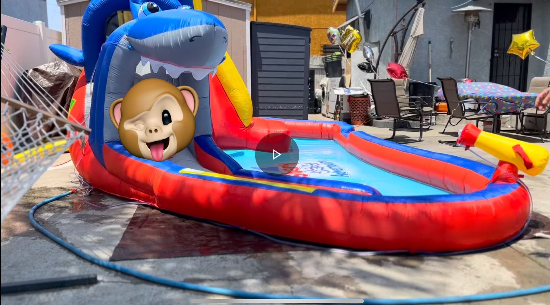 Happy Hop Shark Cave Adventure Bouncy House.