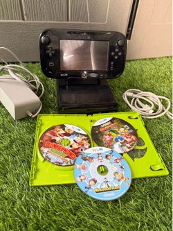 Juego de Wii U y 3 juegos $100