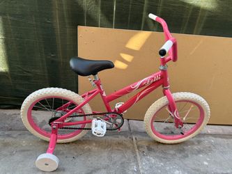 Pacific Cycle Lolli 16" girls' bike featuring a pink steel frame and white tires