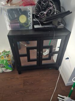Black Wood Cabinet with Glass Panel Doors