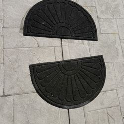 2 black entrance mats
