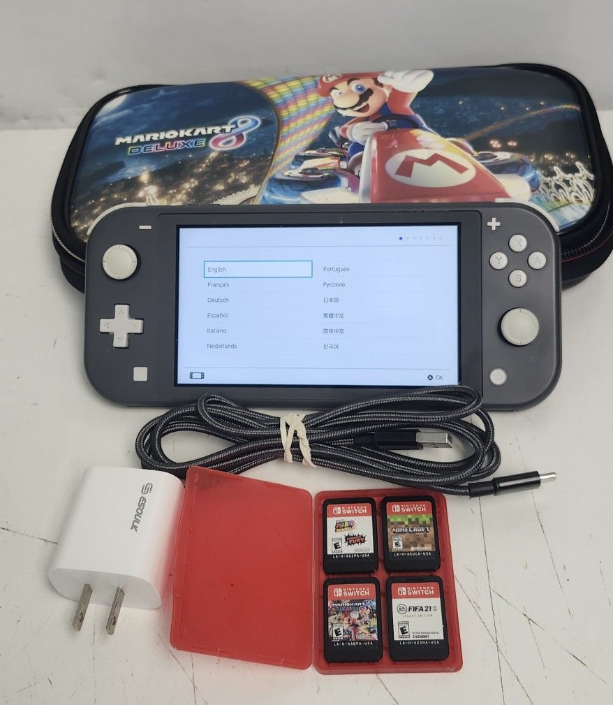 Nintendo Switch Lite W/ 4 Games 