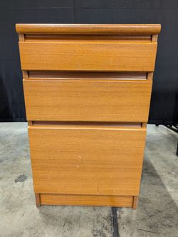 Compact Three-Drawer Wood Storage Cabinet