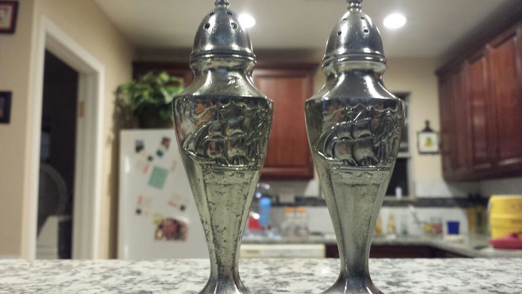 Antique salt and pepper shakers. Solid pewter. God condition.