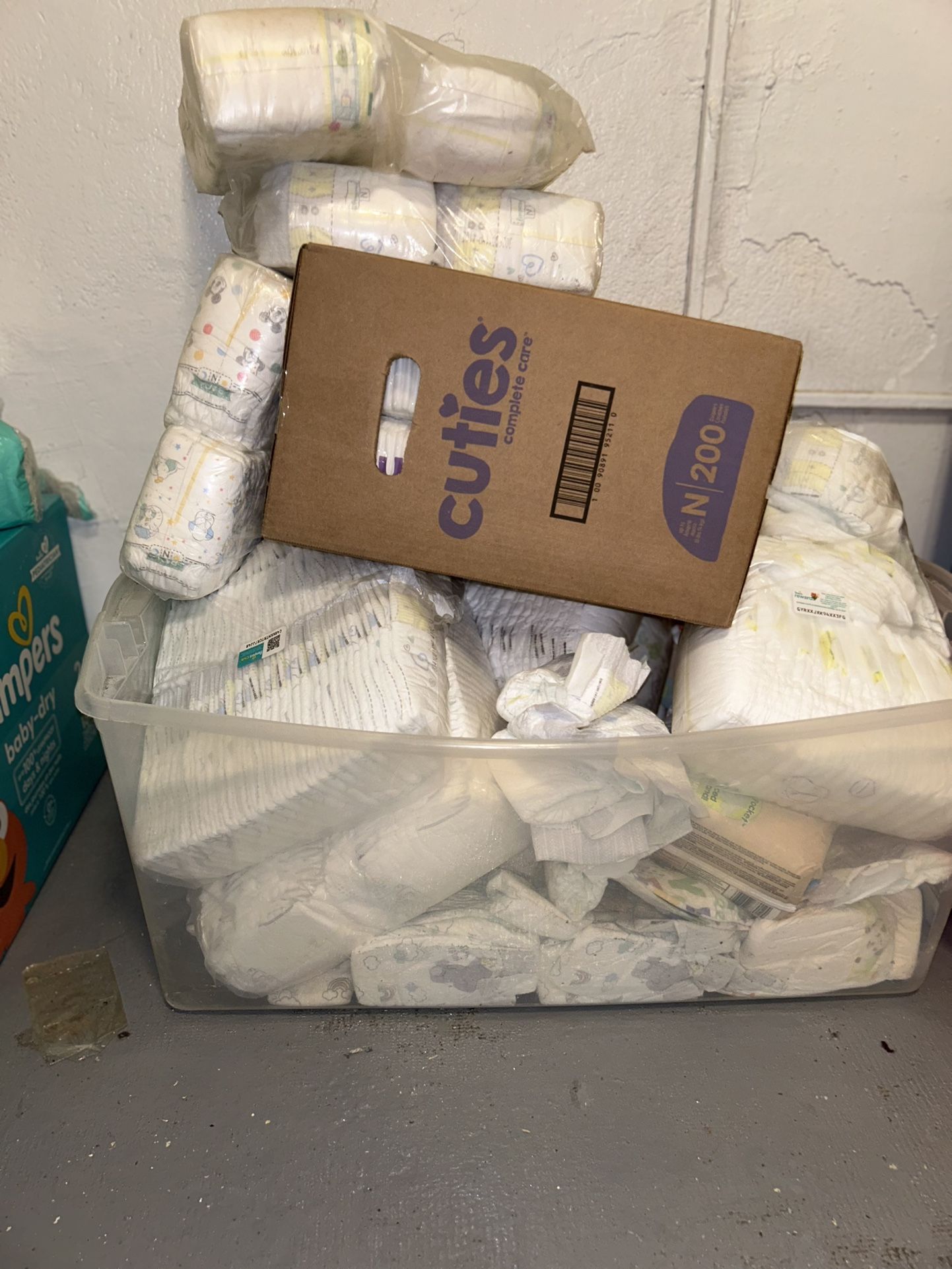 big tub of newborn diapers