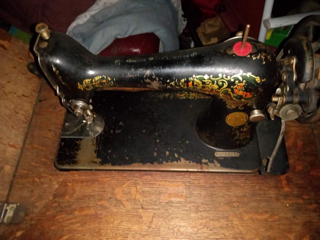 Antique Singer Sewing Machine in Console Table