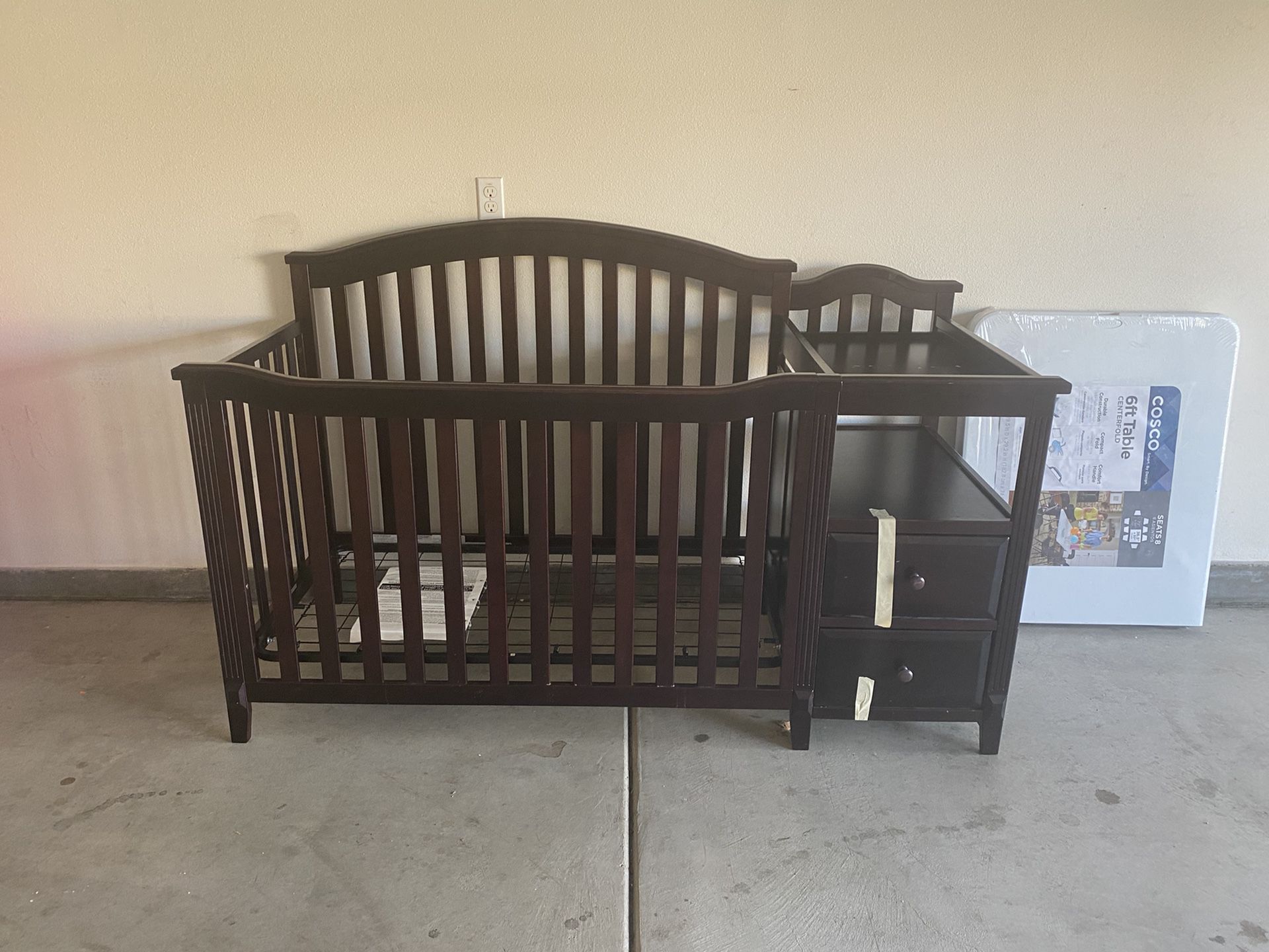 Crib with changing table