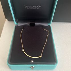 TIFFANY AND CO 18K YELLOW GOLD SMILE PENDANT