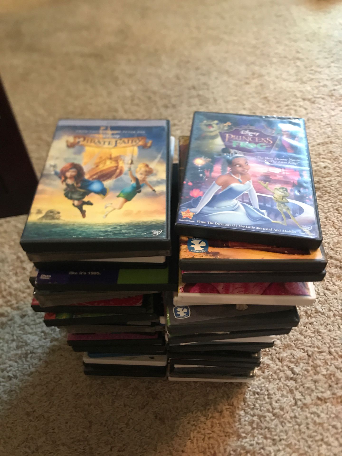 60 dvd movies. All appropriate mix of kids and family movies