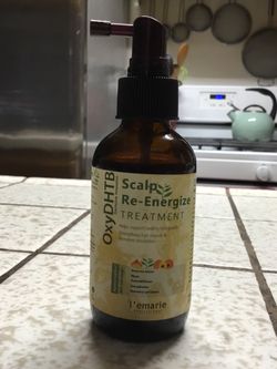 L'emarie Professional Scalp Re-Energize Treatment L'emarie Intensive Energizing Scalp and Hair Growth Treatment an over-the-counter botanical spray pa