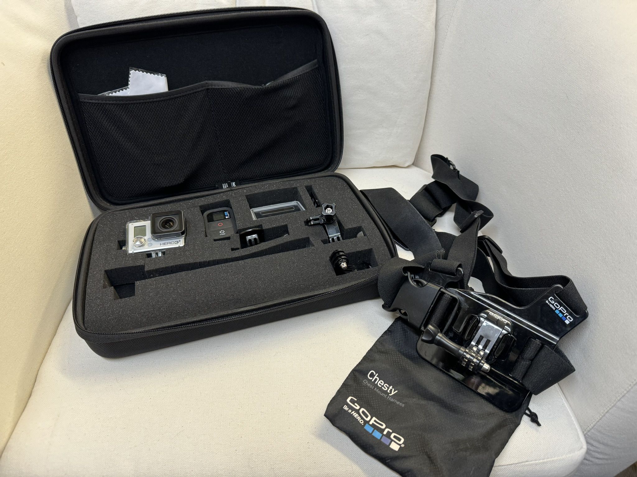 GoPro Hero 3+ with case, chesty, remote + tons accessories