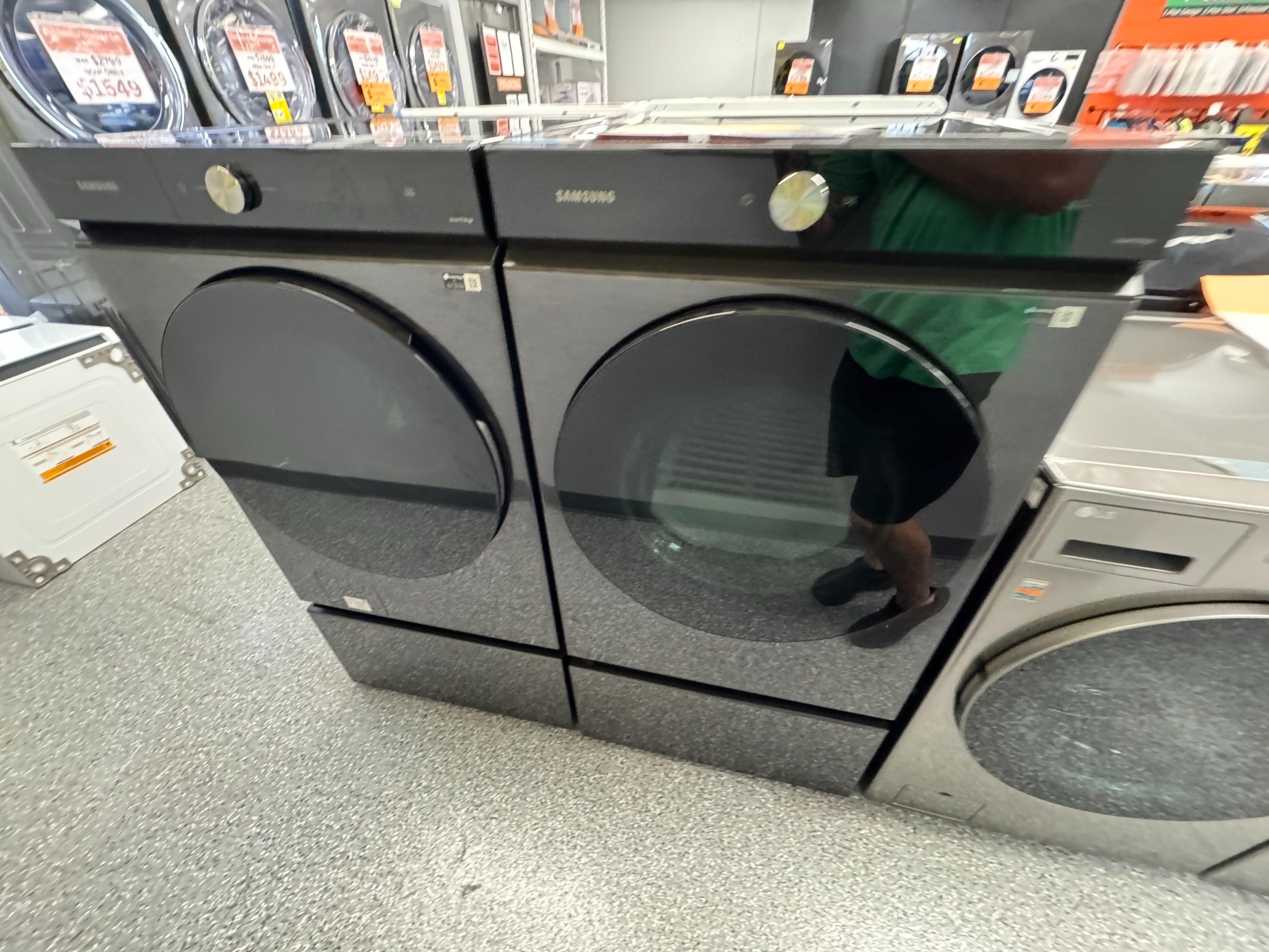 Black Samsung Washer 5.3 cu ft and 7.6 cu ft Gas Dryer Set with Pedastals. Units are new open box scratch and dent