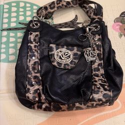 KATHY VAN ZEELAND Black Faux Snakeskin Leopard Print Studded Hobo Bag
