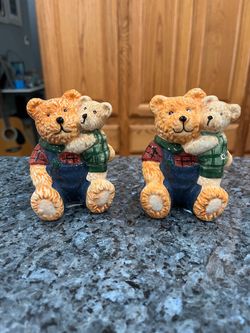 Ceramic Vintage Bear Pair of Salt and Pepper Shakers. Size approximately 4 inches tall. Brand new with tags on the bottom. Has been on display in a